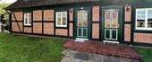 Beide Hauseingänge - Mehrfamilienhaus, Wohnhaus mit 205,00 m² in Klein-Wootz zum Kaufen