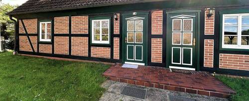 Beide Hauseingänge - Mehrfamilienhaus, Wohnhaus mit 205,00 m² in Klein-Wootz zum Kaufen
