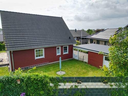 Drohnenbild - Gartenansicht - Einfamilienhaus mit 111,00 m&sup2; in Tarp zum Kaufen