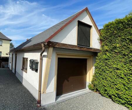 Garage mit Schuppenanbau - Einfamilienhaus mit 210,00 m&sup2; in Sehmatal zum Kaufen