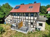 Außenansicht Gartenseite - 8 Zimmer Mehrfamilienhaus, Wohnhaus zum Kaufen in Dahlum