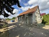 Grundstückszufahrt - Einfamilienhaus mit 95,00 m² in An der Schmücke zum Kaufen