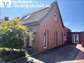 Seitliche Ansicht - Raumwunder! Großes Einfamilienhaus in Nordhorn