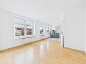 Wohnzimmer mit offener Küche - Zentrale Singlewohnung in HusumRödemis