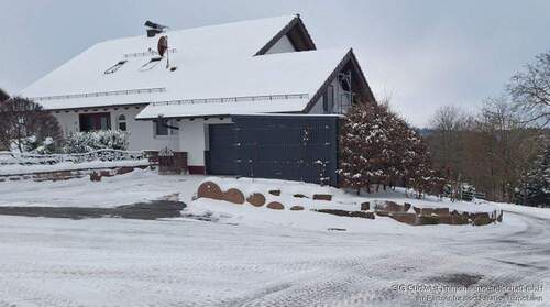 Hausansicht - Neuwertiges Einfamilienhaus mit Aussicht und Garten Ihr perfektes Zuhause für unvergessliche Momente