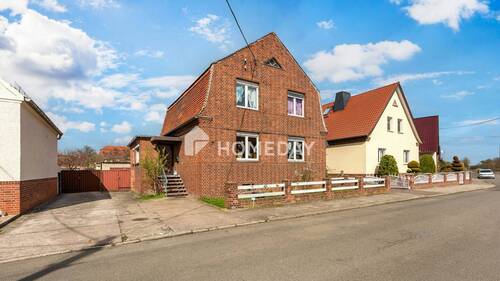 Außenansicht 1 - Solides EFH mit Innenhof, Garage, Nebenhaus und großem Garten in ruhiger Umgebung