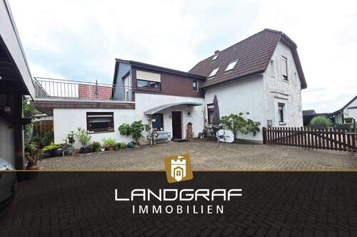 Wohnhaus - Mehr als nur ein Einfamilienhaus – Großes Grundstück mit Extra-Gartenhaus & vielseitigen Nutzungsmöglichkeiten!