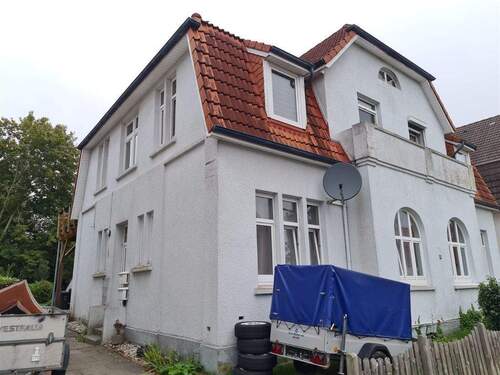 seitliche Ansicht - 1 Zimmer Mehrfamilienhaus, Wohnhaus zum Kaufen in Varel