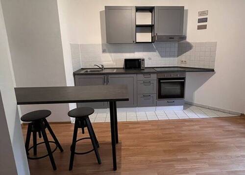 Einbauküche - Erdgeschosswohnung mit Terrasse mitten in der Stadt!