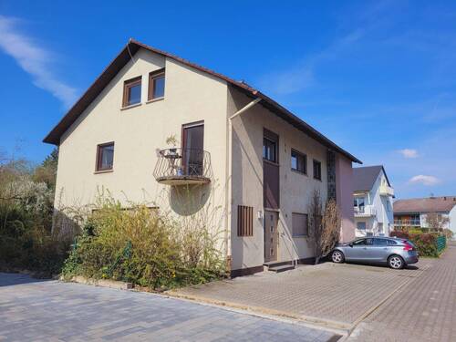 Seitenansicht - 1 Zimmer Mehrfamilienhaus, Wohnhaus zum Kaufen in Rüsselsheim