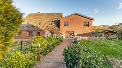 Außenansicht 1 - Mehrfamilienhaus, Wohnhaus mit 324,00 m&sup2; in Ascheffel zum Kaufen