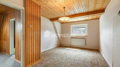 1. OG Schlafzimmer 1 - 