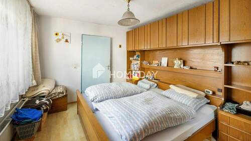 1. OG Schlafzimmer 2 - 