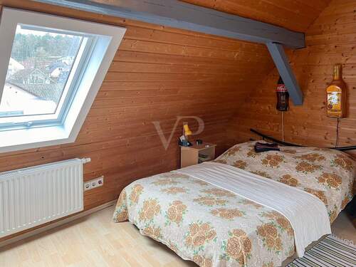 Gästezimmer/Hobbyraum im Dachgeschoss (20m²) - 
