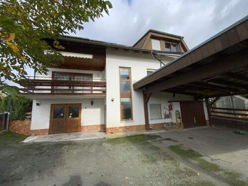 Rückansicht mit Garage - Mehrfamilienhaus, Wohnhaus mit 185,00 m&sup2; in Leun zum Kaufen