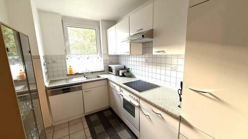 Küche mit Einbauküche - 