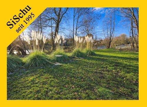Exposé - Idyllisch gelegenes Naturgrundstück direkt am Fluss