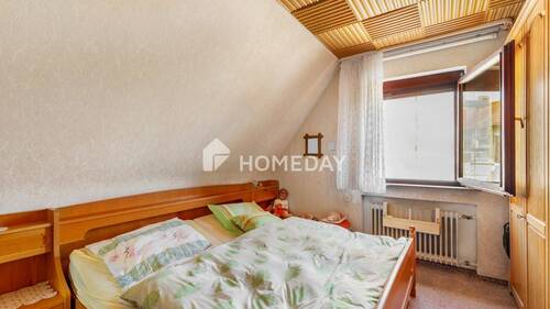 1. OG Schlafzimmer 1 - 