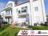 Westseite - Neuwertige Erdgeschosswohung mit Garten und Terrassen!