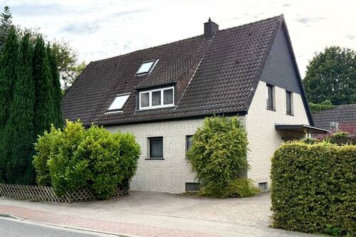 Straßenansicht - Willkommen am Rubbenbruchsee - großzügiges Zweifamilienhaus in Bestlage