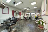 Friseursalon - Mehrfamilienhaus, Wohnhaus mit 70,00 m&sup2; in Heide zum Kaufen