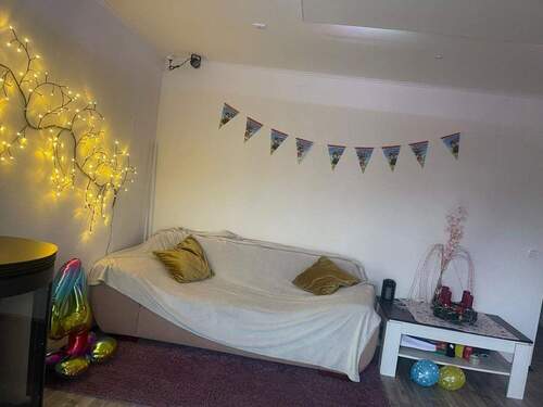 Wohnzimmer unten - 7 Zimmer Einfamilienhaus zum Kaufen in Mücke