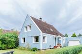 1 Straßenseite - 5 Zimmer Einfamilienhaus zum Kaufen in Tolk