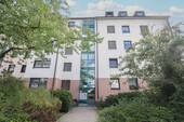 Außenansicht Haus - Vermietete, gepflegte Dachgeschosswohnung für Anleger in ruhiger Lage