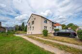 Hausansicht - 5 Zimmer Etagenwohnung zur Miete in Hohenlockstedt