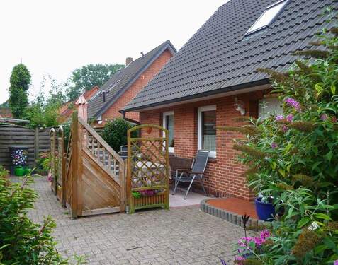 Terrasse - Einfamilienhaus mit 111,80 m&sup2; in Wardenburg zum Kaufen