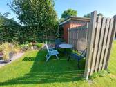 kleine Whg. EG - Sitzecke im Garten - 