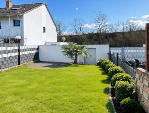 Garten - (KI generiert) - Reihenmittelhaus mit 153,00 m&sup2; in Ketsch zum Kaufen