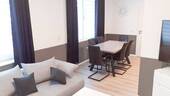 Wohnzimmer - Exklusives Wohngefühl in Oberndorf - moderne Wohnung mit hochwertiger Ausstattung!