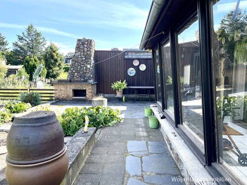 Terrasse mit Kamin und Wintergarten - 