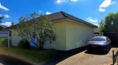 Ansicht mit Stellplatz - Bungalow mit 80,00 m² in Hohenlockstedt zum Kaufen