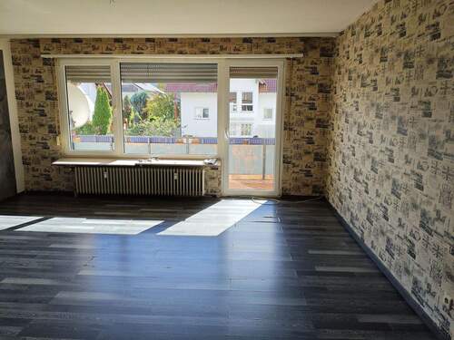 Wohnzimmer 1 - 4 Zimmer Etagenwohnung in Fischbach