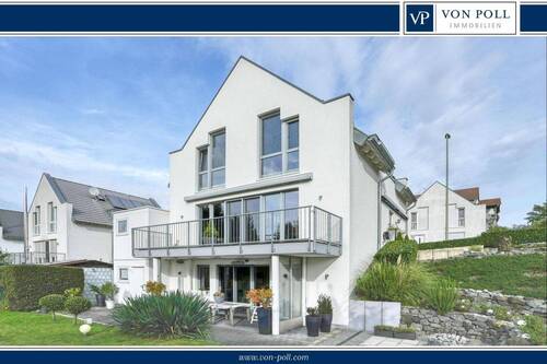 Ansicht Gartenseite - Junges, familienfreundliches Einfamilienhaus mit Top-Ausstattung in ruhiger, grüner Wohnlage