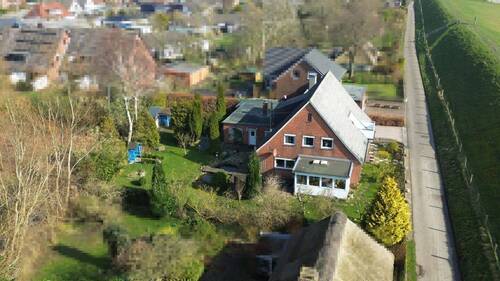 Gesamtansicht/Garten - Einfamilienhaus mit 225,00 m² in Tönning zum Kaufen