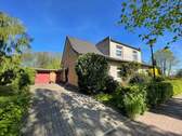Auffahrt - 7 Zimmer Mehrfamilienhaus, Wohnhaus zum Kaufen in Schortens
