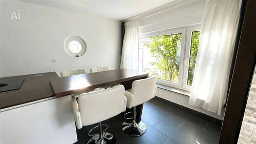 Kochinsel mit Esstisch - 