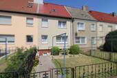 Hinteransicht - Reihenmittelhaus mit 69,00 m² in Goldberg zum Kaufen