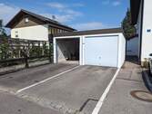 Garage mit Stellplatz (links) - 