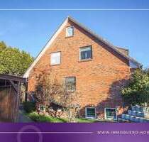 Doppelhaushäfte mit wohnlichem Souterrain - Sarlhusen