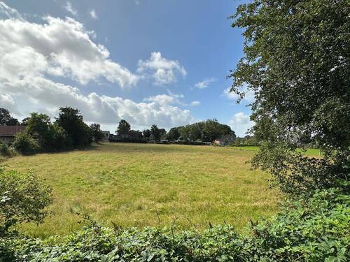 Blick vom Balkon ins grüne - Etagenwohnung mit 74,80 m² in Mildstedt zum Kaufen