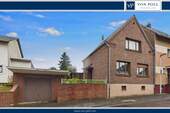 Titelbild - Sanierungsbedürftiges Einfamilienhaus mit Garage und Garten in Bergheim-Glessen