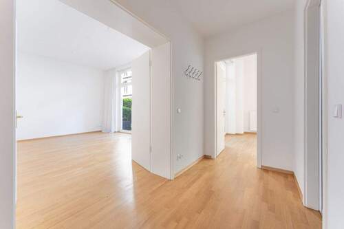 Hallway with view into the living area and bedroom - 
