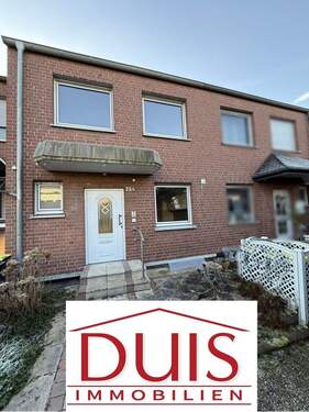 Bild 1 - Hübsches Reihenhaus mit viel Platzt und Garage