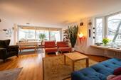 großzügiges Wohnzimmer - 3 Zimmer Etagenwohnung zum Kaufen in München