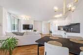 Wohnzimmer - Hochwertige 2-Zimmer-Wohnung mit Weitblick und direktem Zugang zu Einkaufsmöglichkeiten
