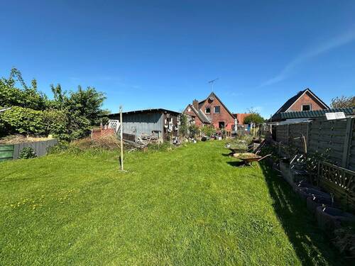 Sicht aus dem Garten - Einfamilienhaus mit 101,00 m² in Lunden zum Kaufen